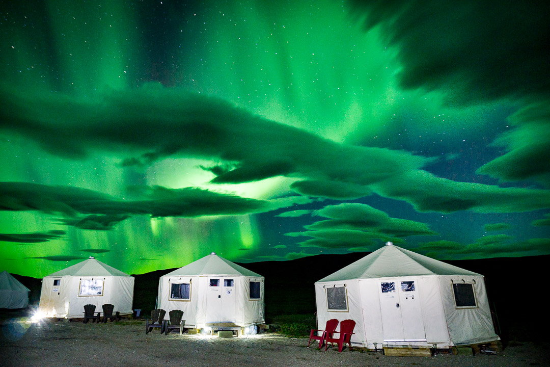 Northern lights and sleeping tents, Torngat Mountains Base Camp and Research Station, Northern Labrador Mountains, (Newfoundland and Labrador), Canada