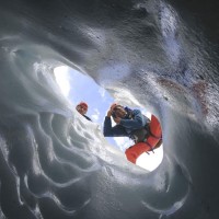 Herb Weller and Pat explore the sculpted crevasses of Robson glacier © Max Darrah