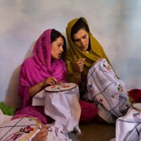 Women's cooperative handicraft centre, Misgar village just north of Sost, Hunza Valley, Karakoram Range. Pakistan. 2014. © Pat Morrow
