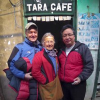 Pat, Baiba and Nima outside Tara Cafe, Dharamsala, India Â© Pat Morrow 2012