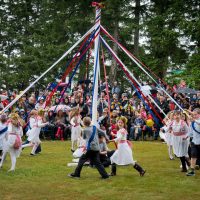 Dancing around the maypole during the May Day celebration, Quadra Island. Thompson Rivers University Adventure Studies Department Sailing Trip, Port Hardy to Sidney, BC May 21 - June 2