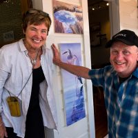 Artist Janet Andrews and photographer Simon Hoyle outside their studio, Days Bay, near Wellington, NZ