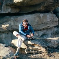 Mike Sawyer boulders on sandstone crag nw of Calgary c 1976