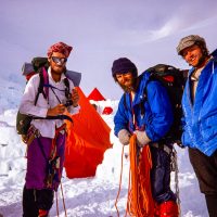 Bernhard Ehmann, Riley ___, Matt Helm, Pat Morrow at 14,000 ft camp on Denali after B&P completed the first ascent of SW Rib, and were on to climb Orient Express on the west face, 1977