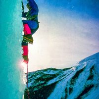 Jim Elzinga on first pitch of normal route on Weeping Wall, Banff National Park, Canadian Rockies, 1975 Calgary Mountain Club